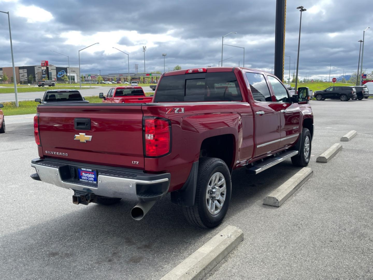 2019 MAROON CHEVROLET SILVERADO 2500H LTZ (1GC1KTEY5KF) with an 6.6L engine, Automatic transmission, located at 1960 Industrial Drive, Wasilla, 99654, (907) 274-2277, 61.573475, -149.400146 - Photo#3